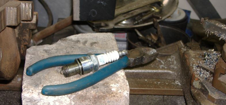 NGK worn flat side from Improper plugs